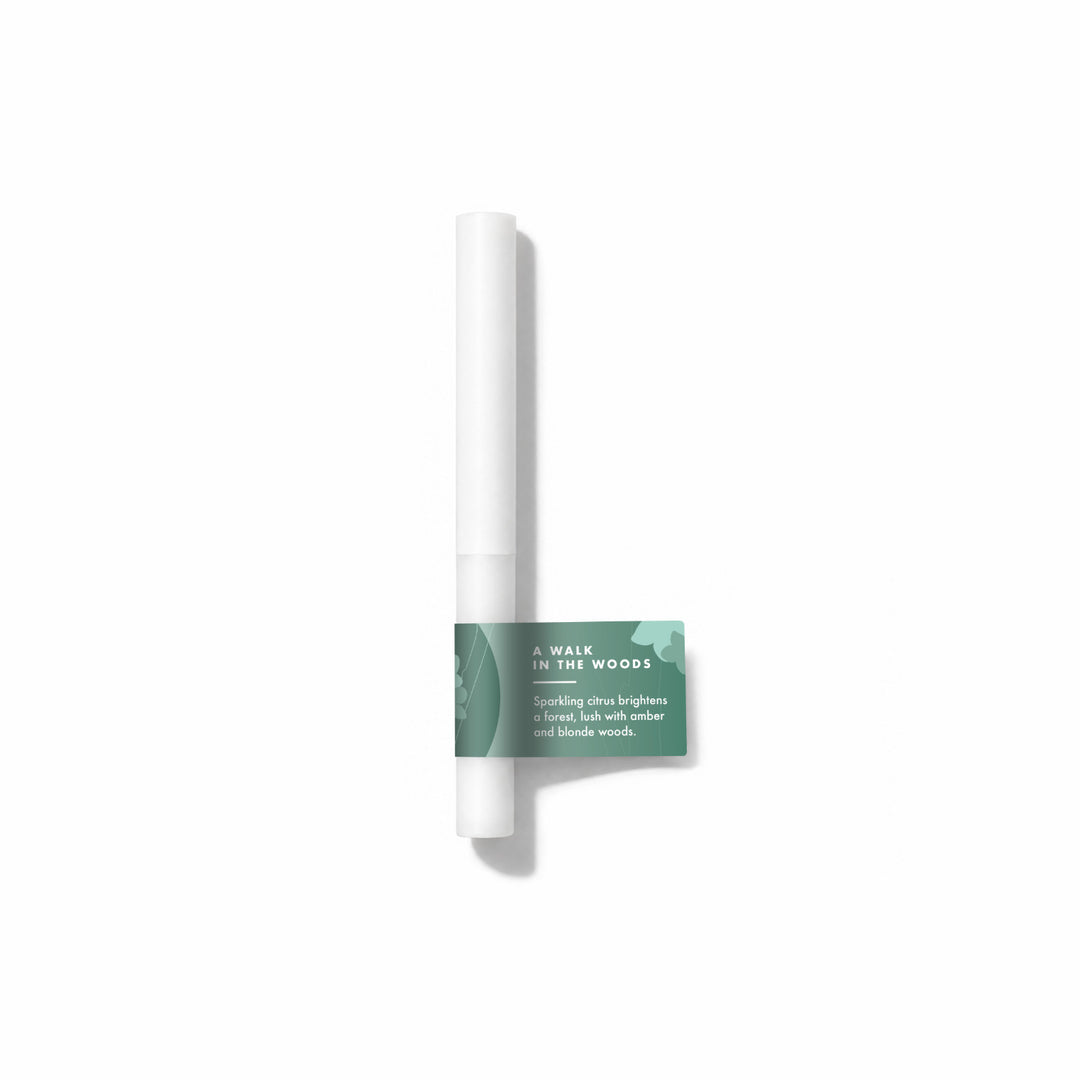 A Walk In The Woods Fragrance Sample Stick - Sparkling citrus brightens a forest, lush with amber and blonde woods.
